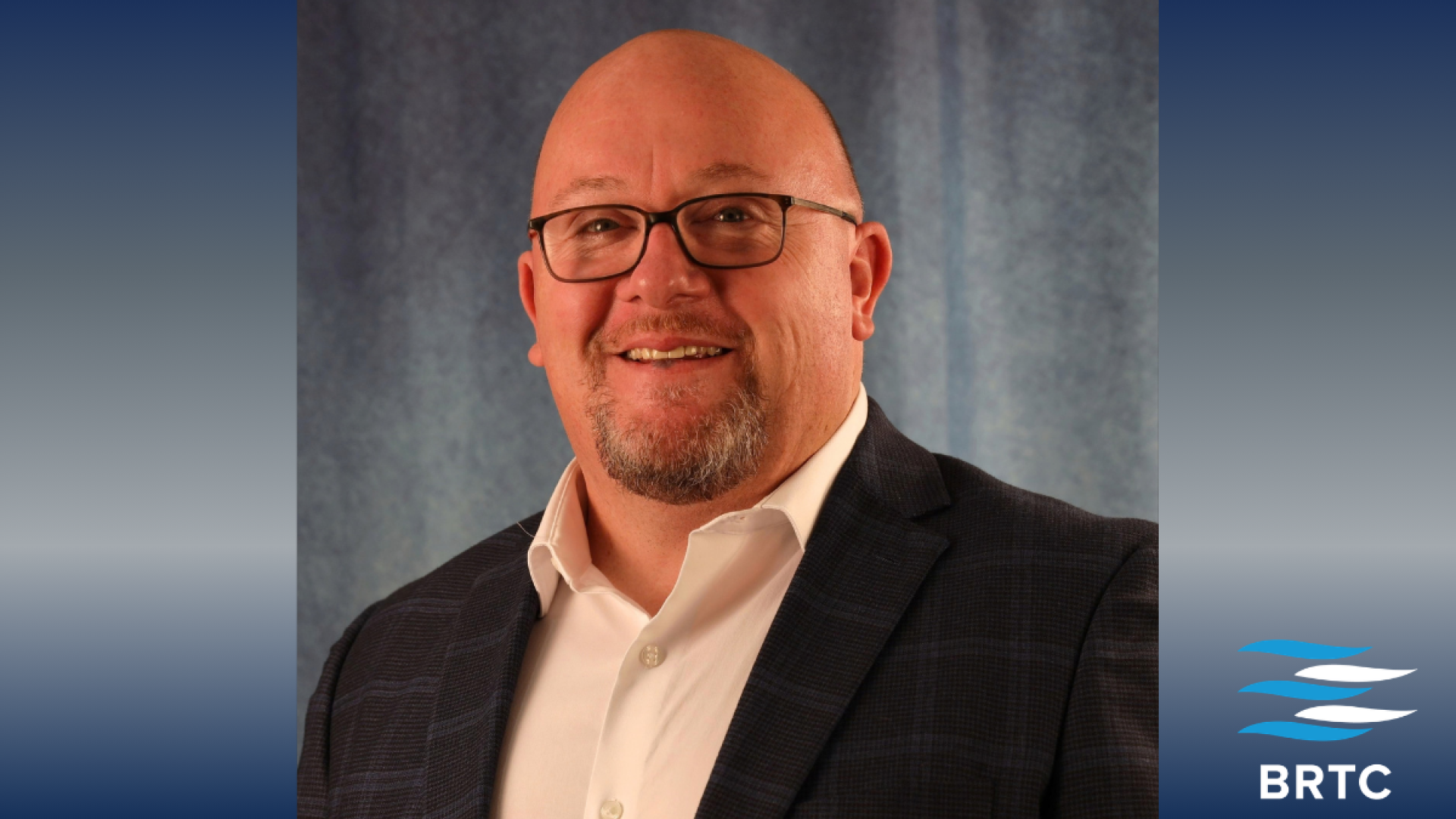 Jason Linam, a bald man with glasses and a goatee, smiles in a professional headshot wearing a plaid blazer, with the BRTC logo displayed in the corner.
